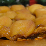 apple tarte tatin on a gold plate